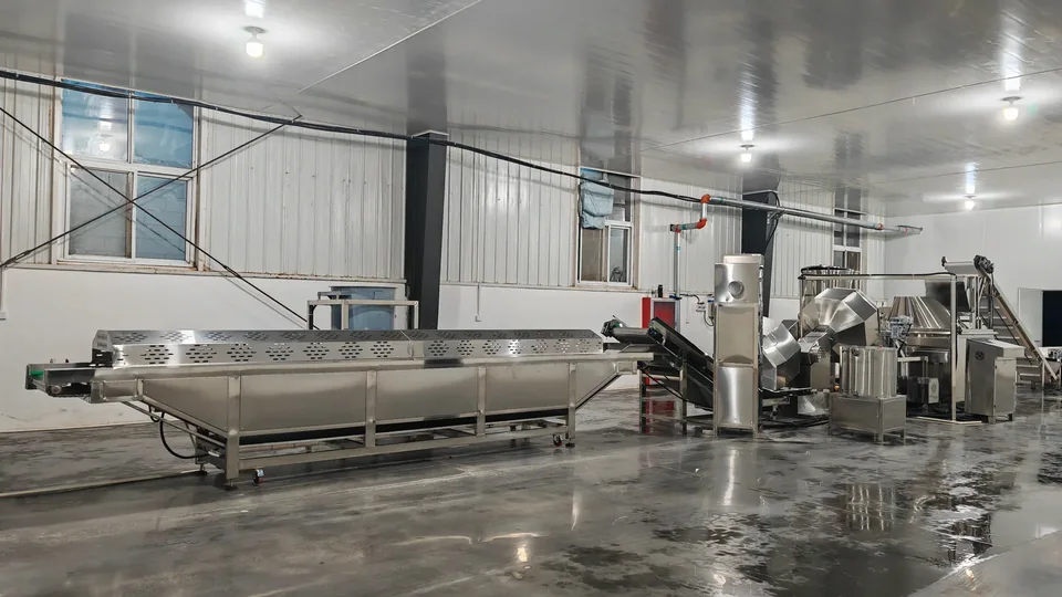 Connected snack processing equipment photographed in a workshop